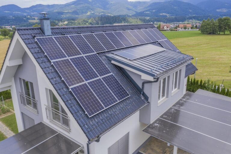 Aerial-view-private-house-with-solar-panels-roof